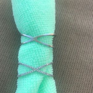 Sterling X rings. Size 12